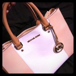 Michael Kors tan and white Sutton purse